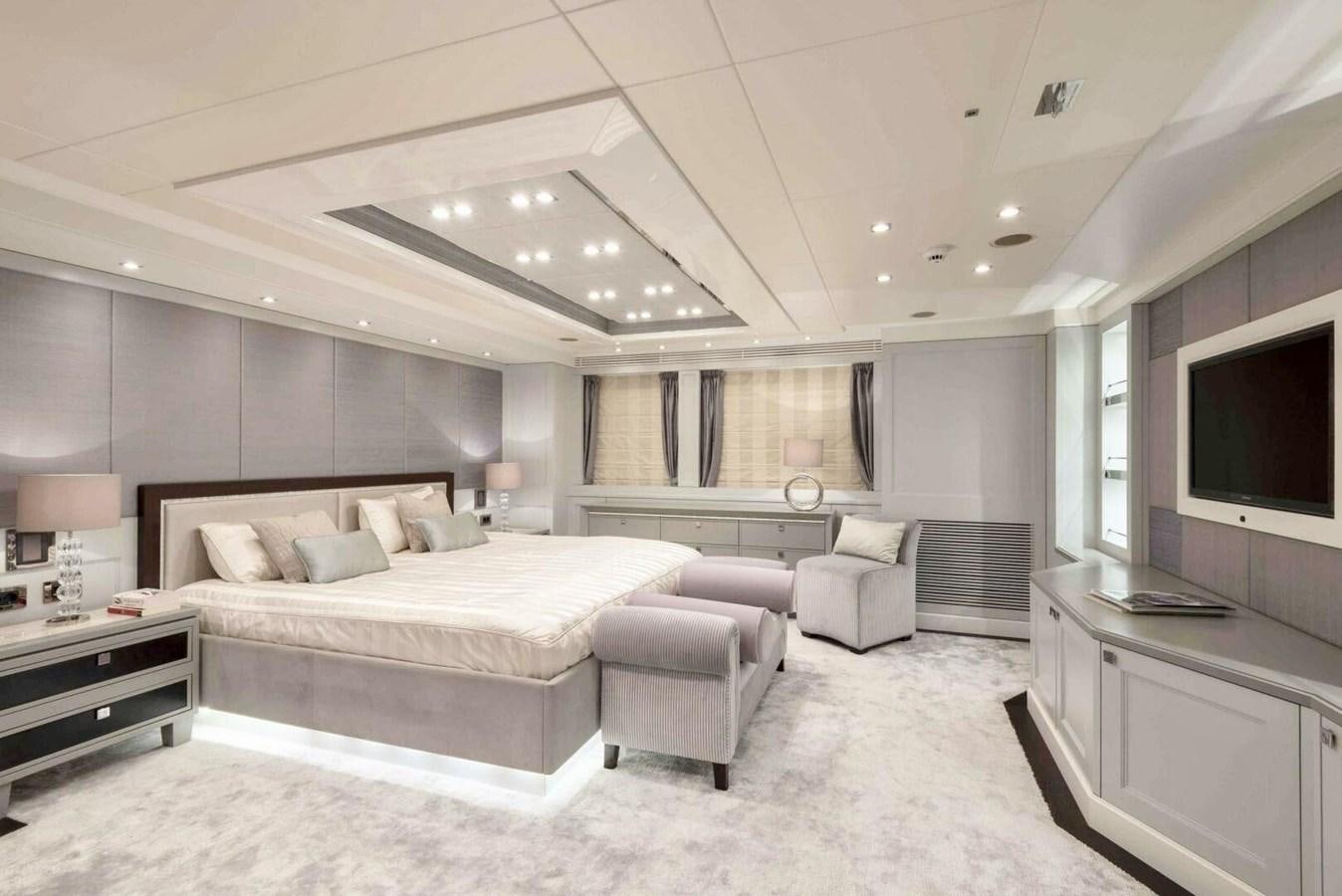 a large bedroom with a large bed aboard SUNSEEKER 131 2012 40 M Yacht for Sale