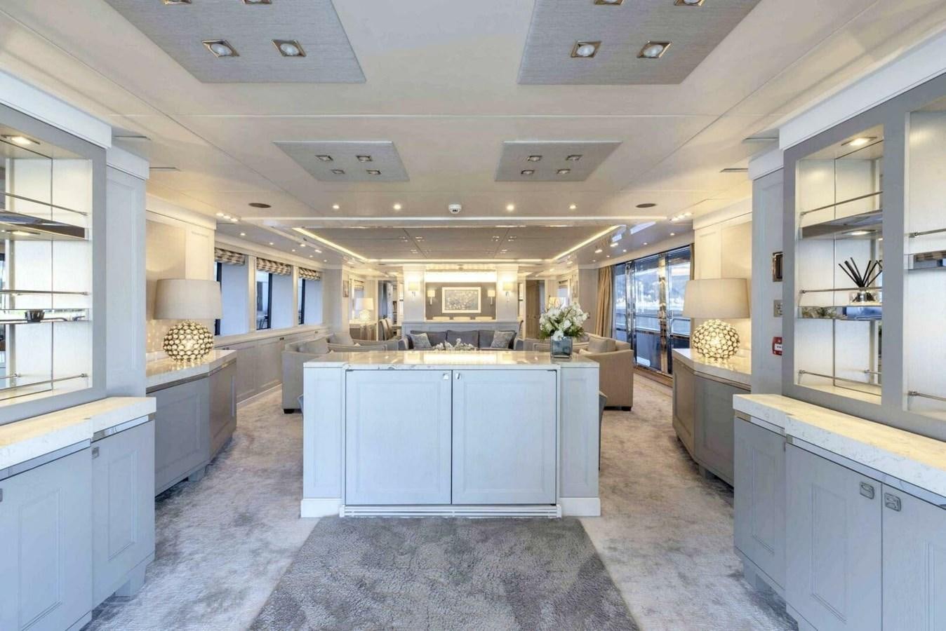 a kitchen with a marble floor aboard SUNSEEKER 131 2012 40 M Yacht for Sale