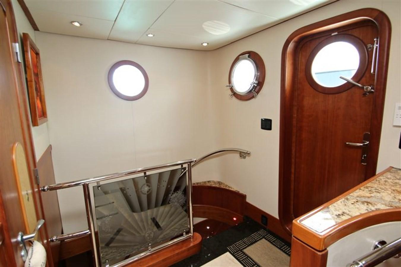 a room with a mirror and a sink aboard IMPETUS Yacht for Sale