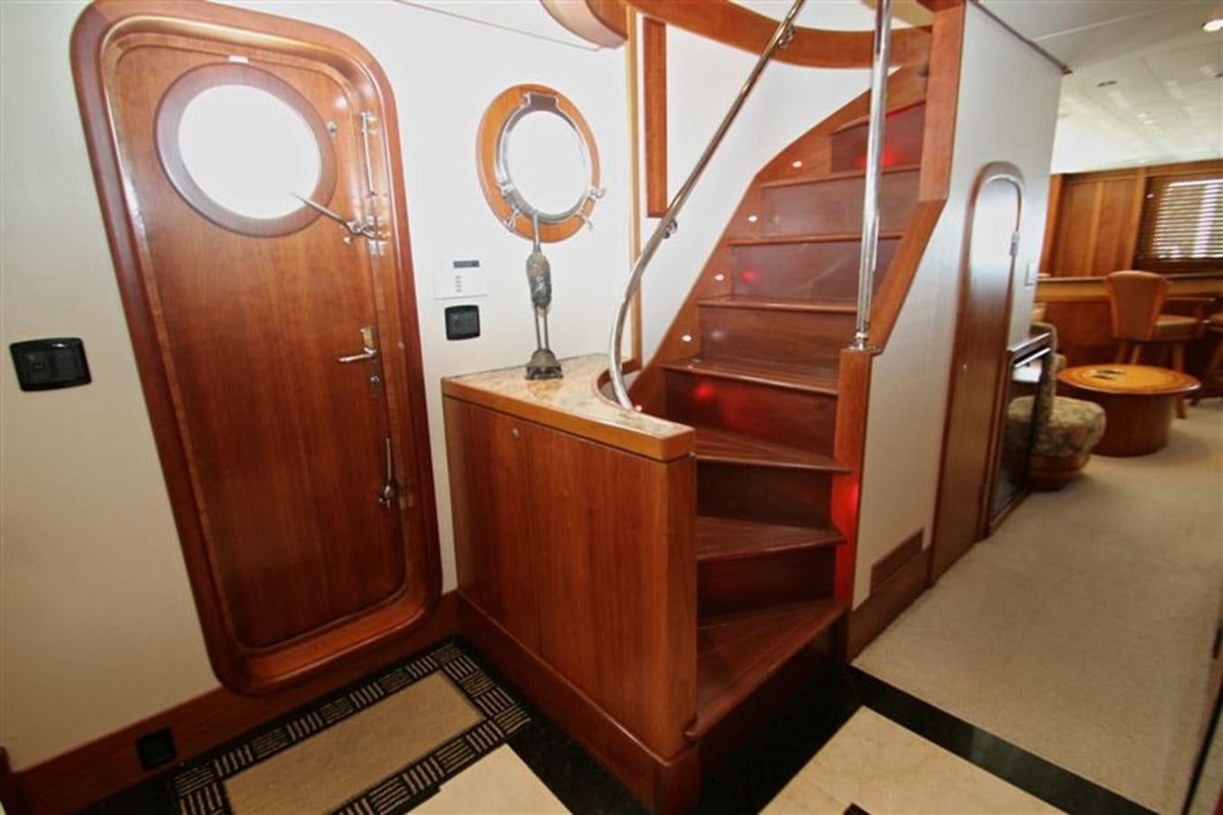 a wooden door in a room aboard IMPETUS Yacht for Sale