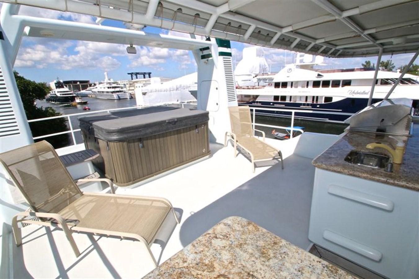 a boat dock with boats aboard IMPETUS Yacht for Sale