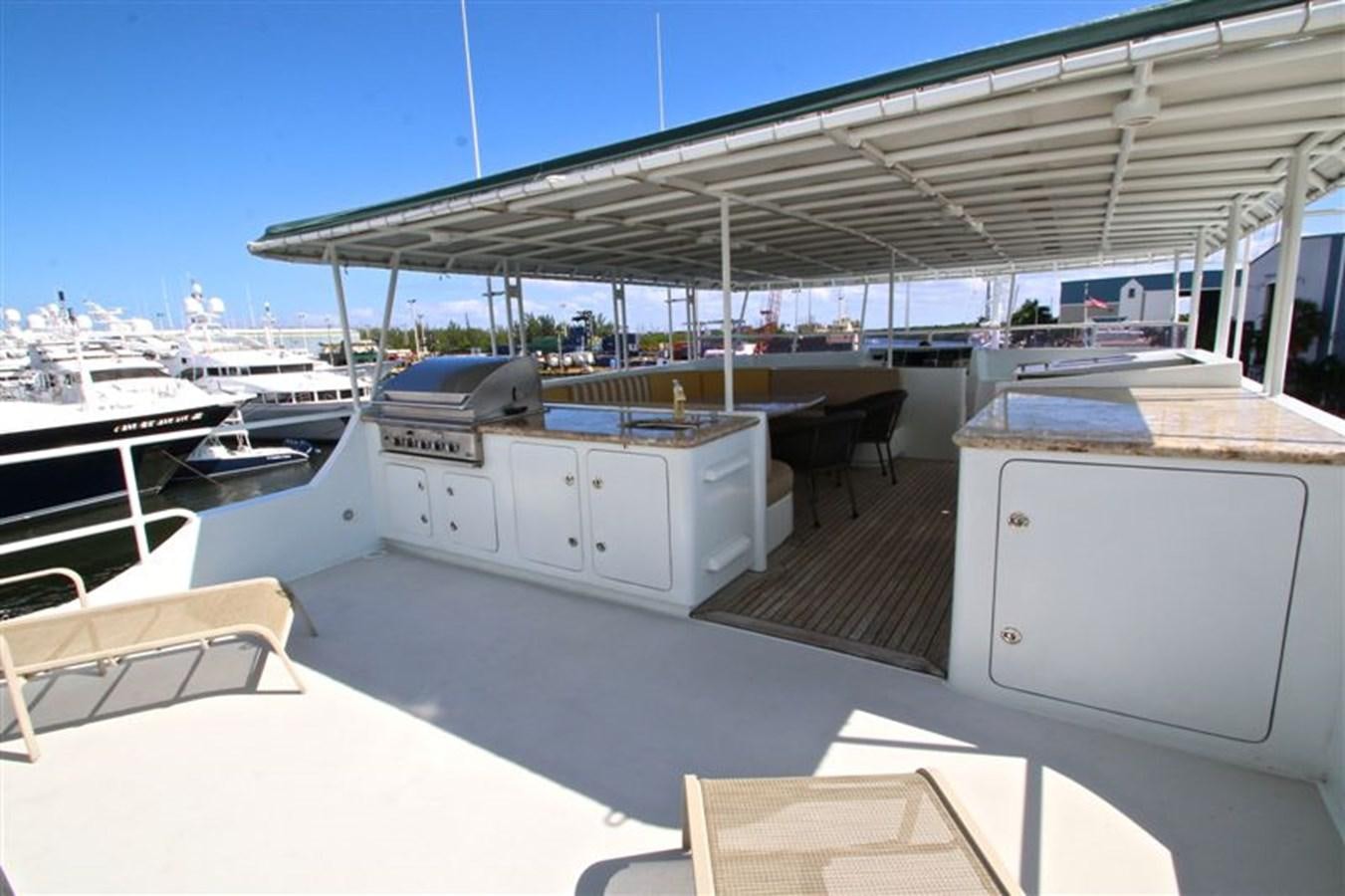 a boat dock with many boats aboard IMPETUS Yacht for Sale