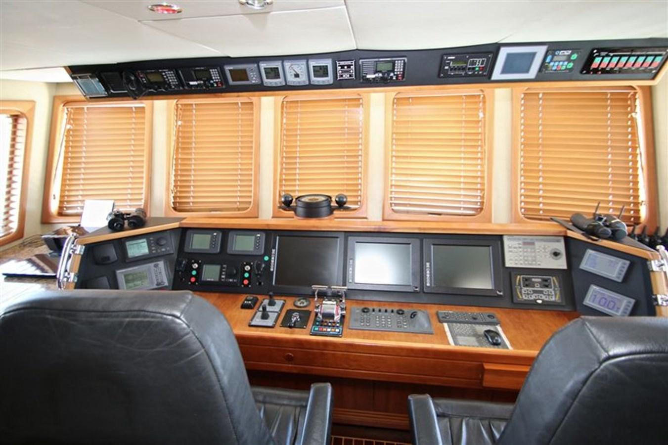 a room with a computer and a chair aboard IMPETUS Yacht for Sale