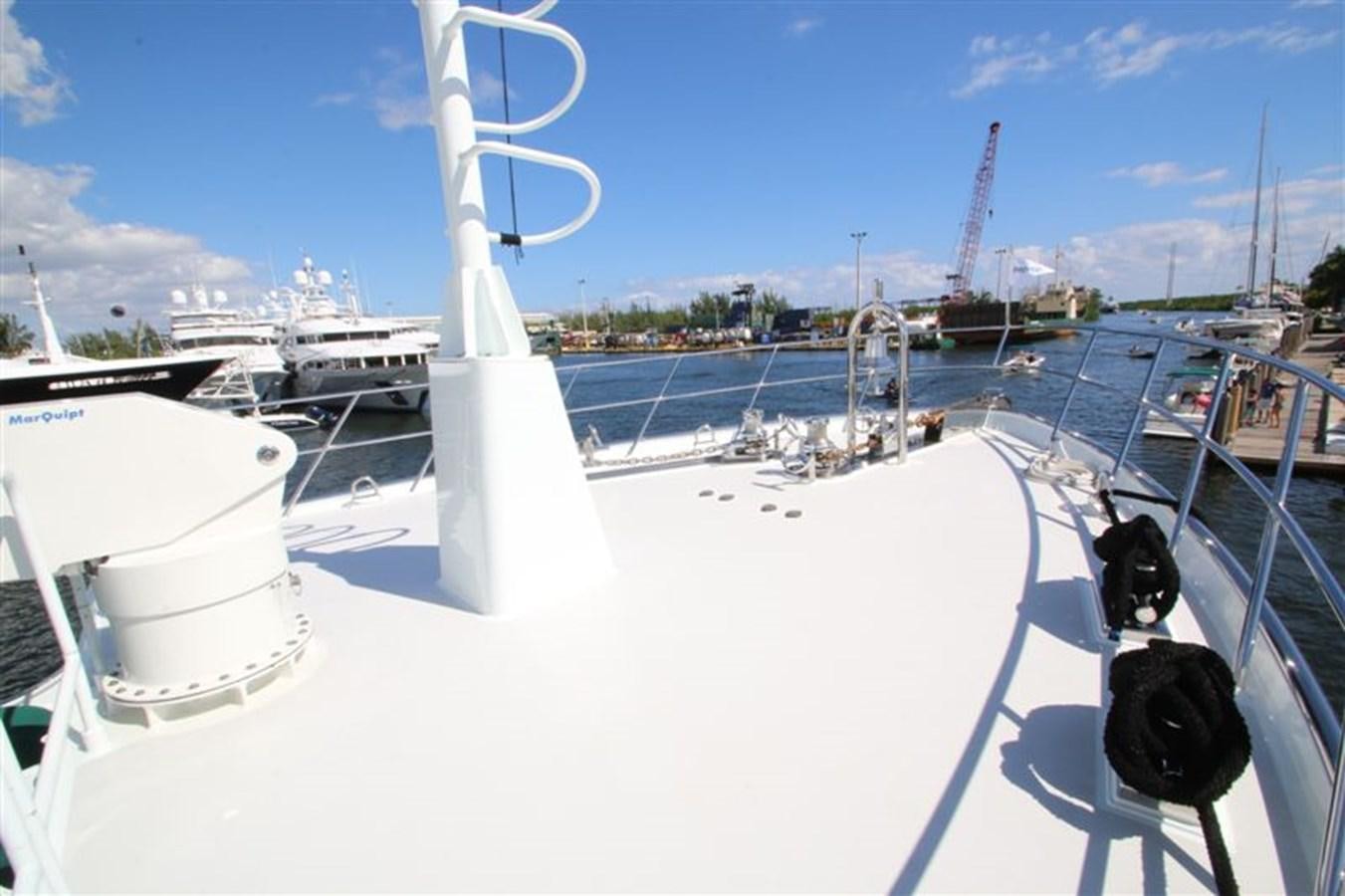 a black and white cat on a boat aboard IMPETUS Yacht for Sale