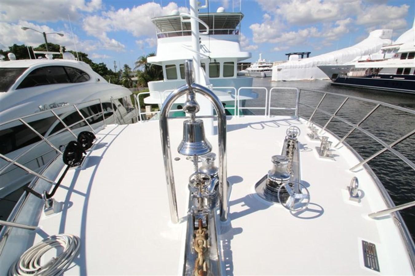 a white ship docked aboard IMPETUS Yacht for Sale