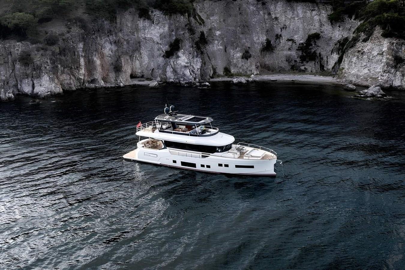 a couple of boats on the water aboard SIRENA 68 Yacht for Sale