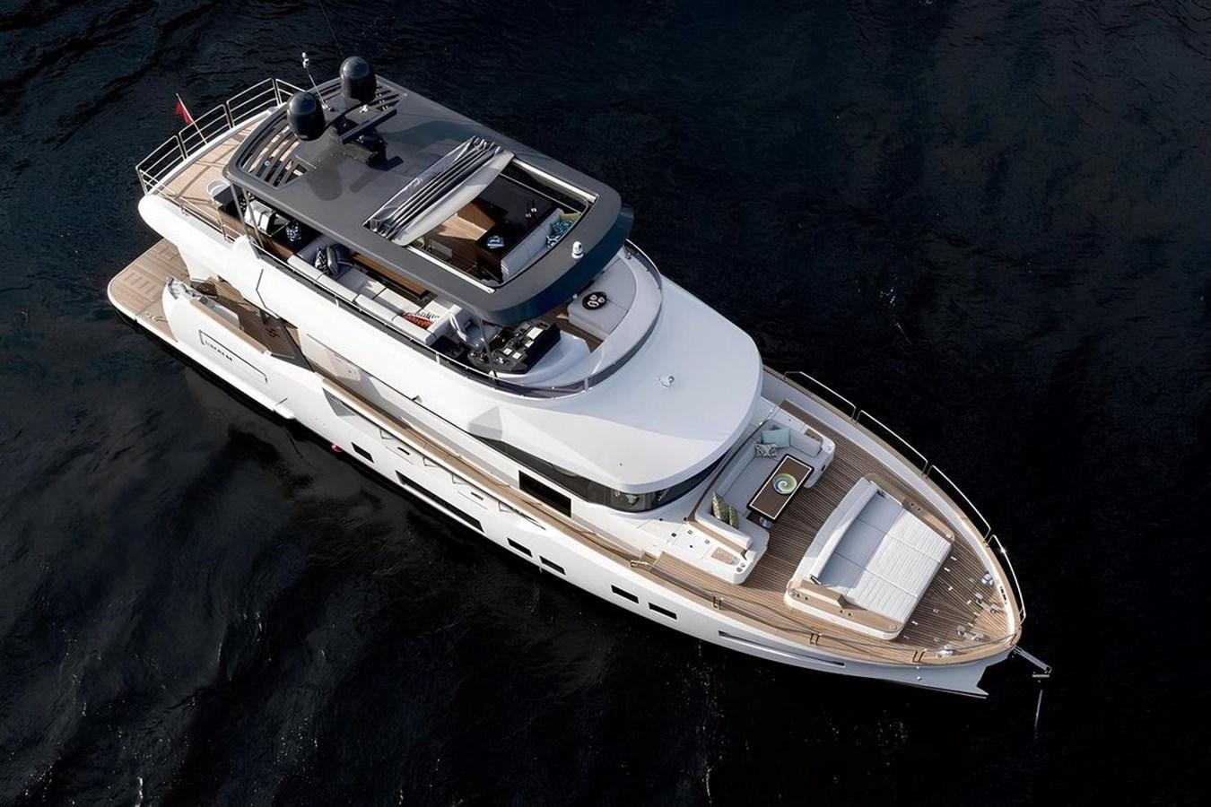 a white boat in the water aboard SIRENA 68 Yacht for Sale