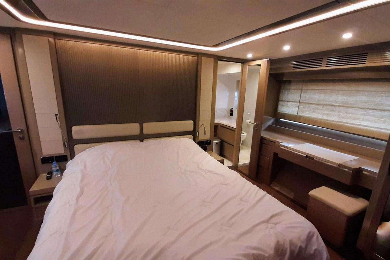 a bed in a room aboard SIRENA 68 Yacht for Sale