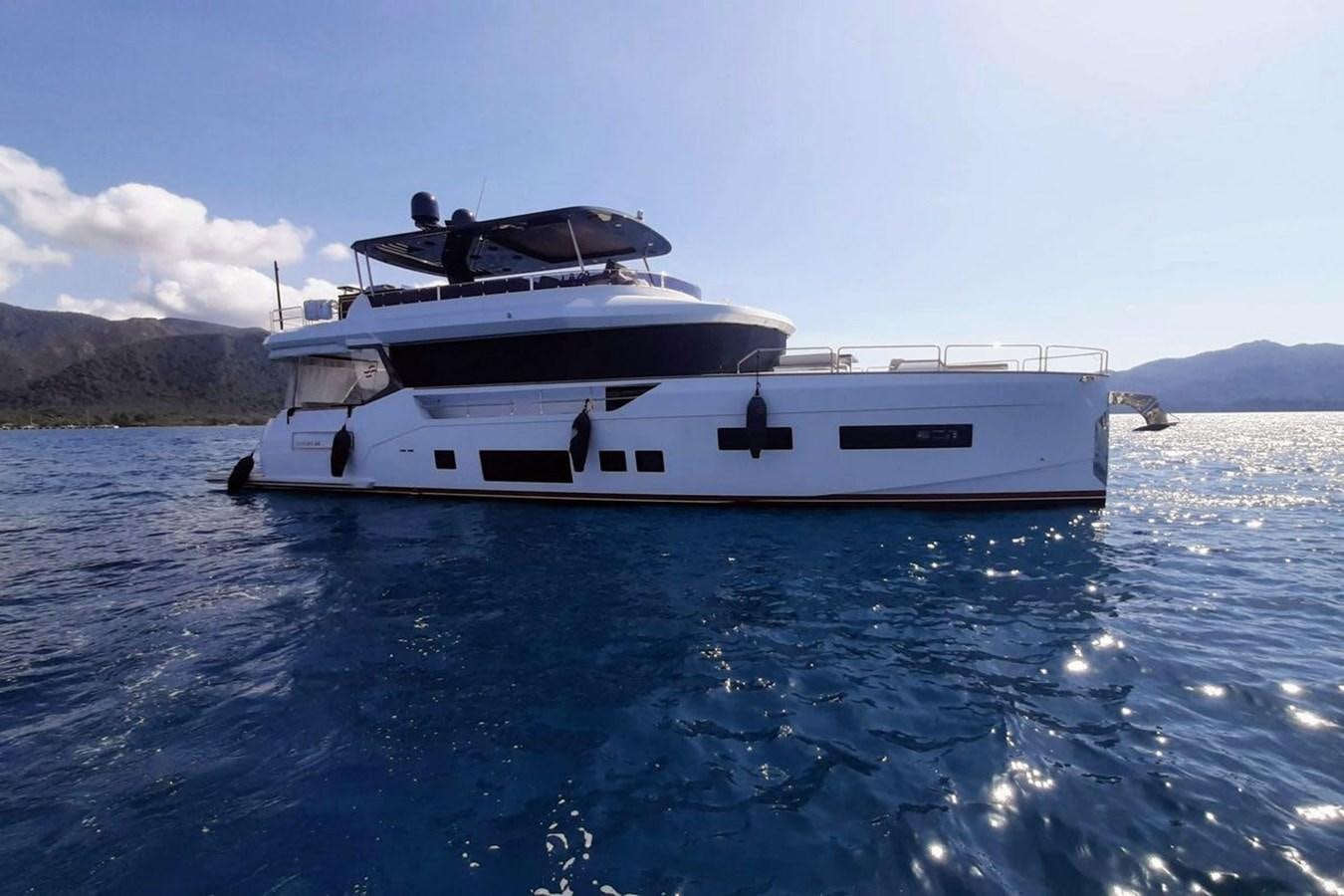 a white yacht in the water aboard SIRENA 68 Yacht for Sale