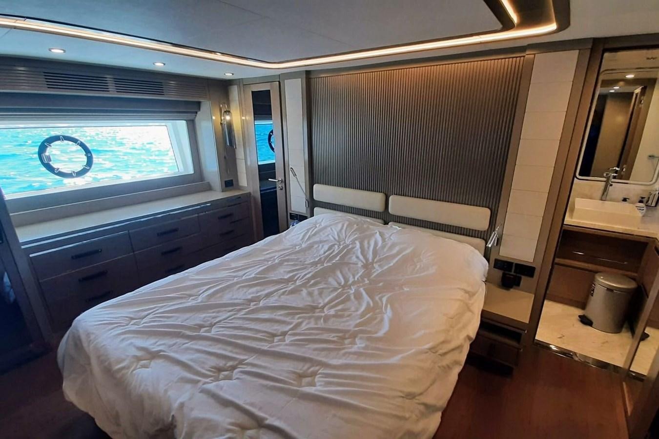 a bed in a room aboard SIRENA 68 Yacht for Sale