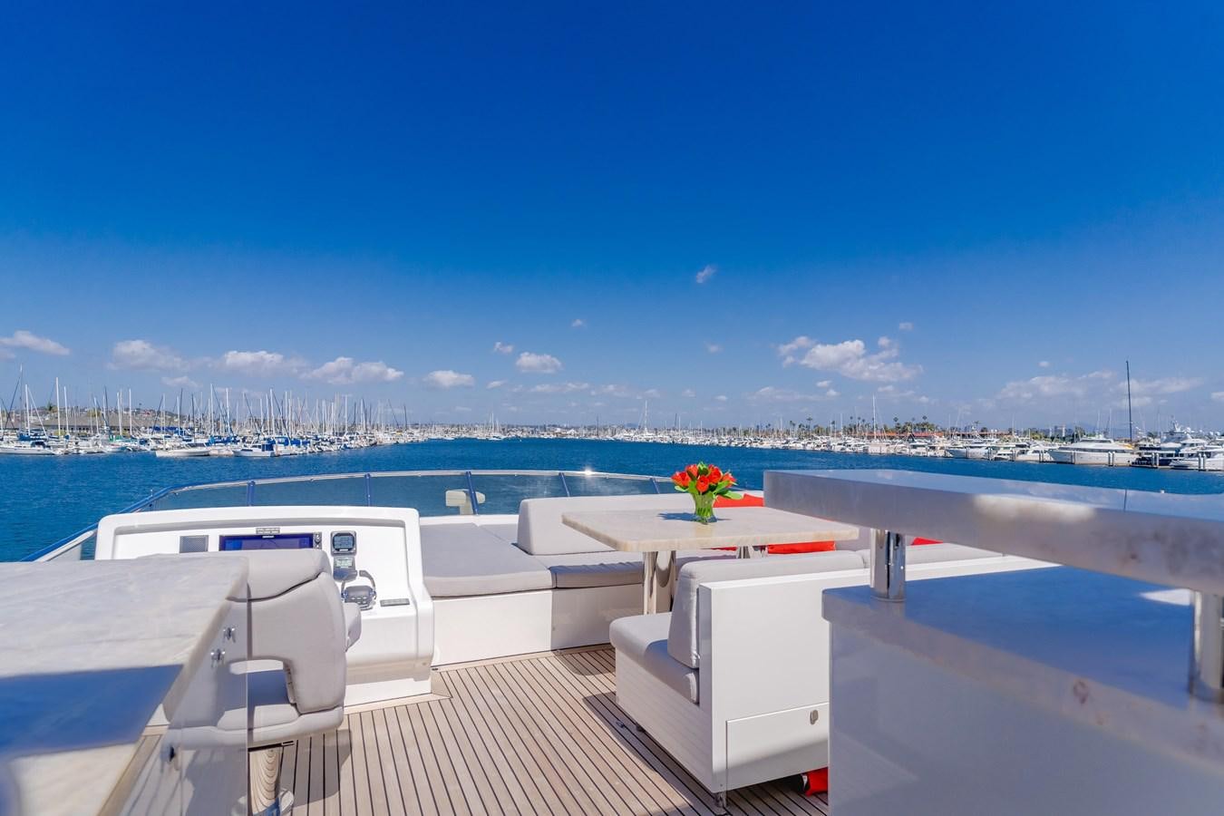 a deck overlooking a body of water aboard GYRFALCON Yacht for Sale
