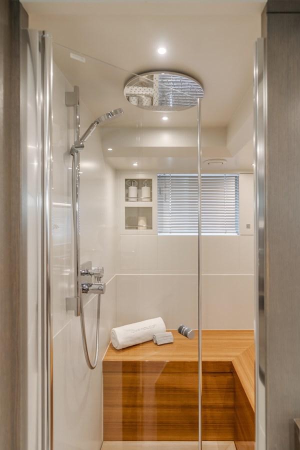 a shower with a glass ceiling aboard GYRFALCON Yacht for Sale