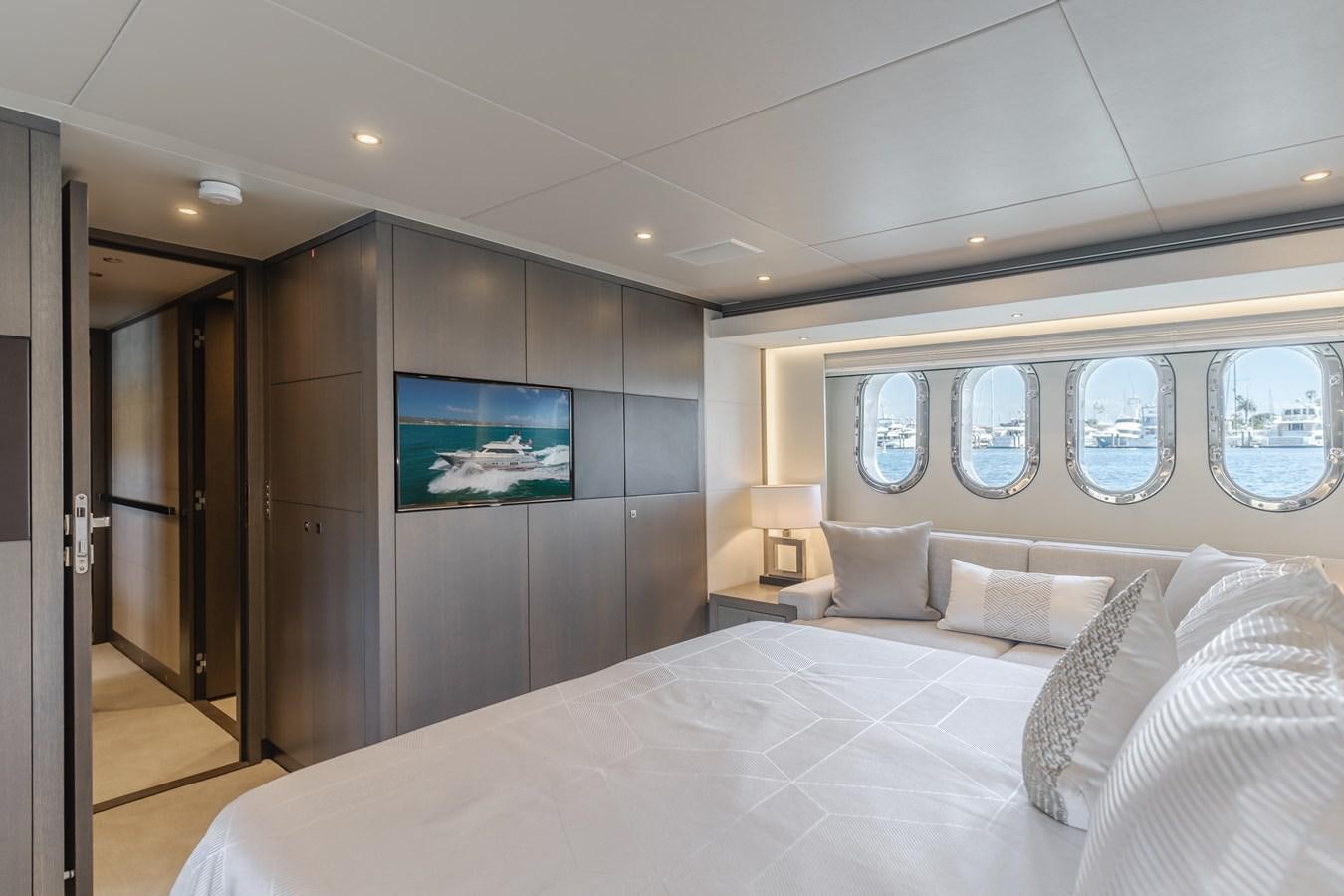a large hotel room with a large bed aboard GYRFALCON Yacht for Sale