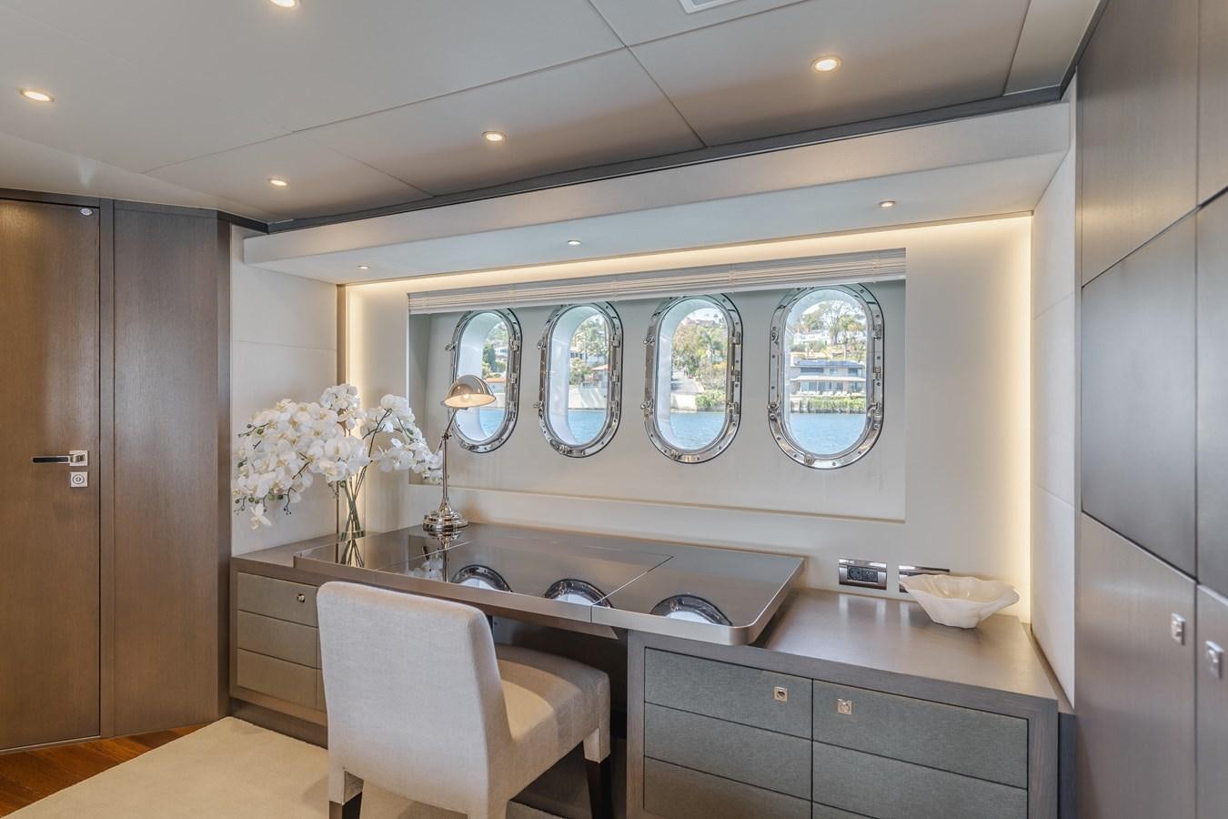 a kitchen with a large island aboard GYRFALCON Yacht for Sale
