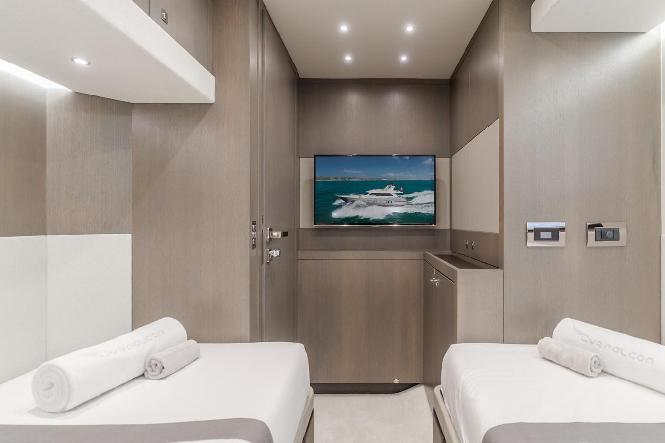 a hotel room with a tv aboard GYRFALCON Yacht for Sale