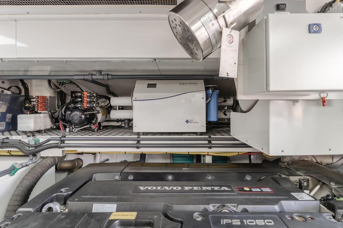 a machine with a large piece of equipment in it aboard GYRFALCON Yacht for Sale