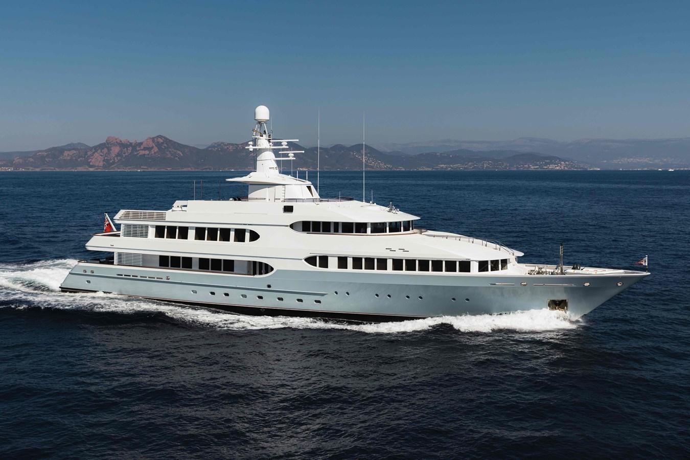 a large white boat in the water aboard OLYMPUS Yacht for Sale