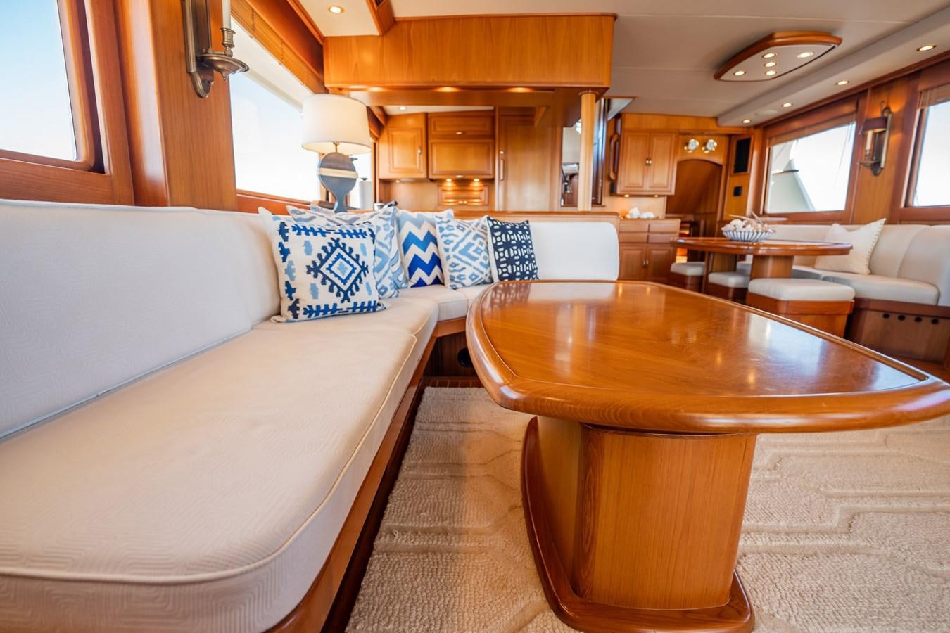 a living room with a couch and a table aboard BEBA Yacht for Sale