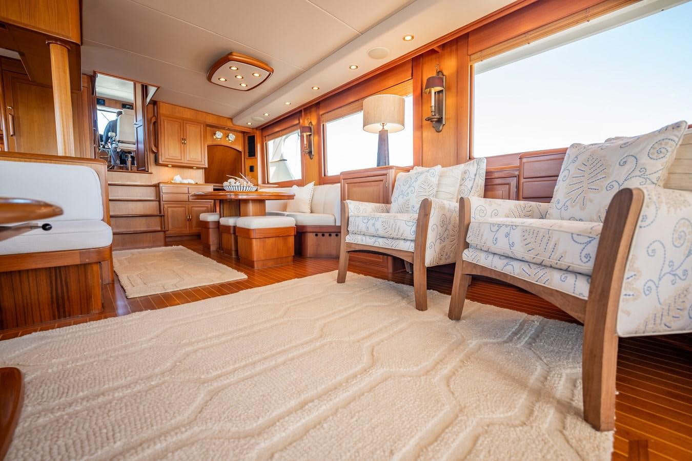 a living room with a couch and a table aboard BEBA Yacht for Sale
