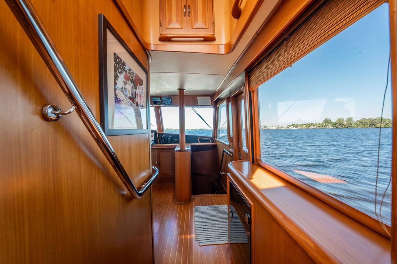 a train with a view of the water and trees aboard BEBA Yacht for Sale