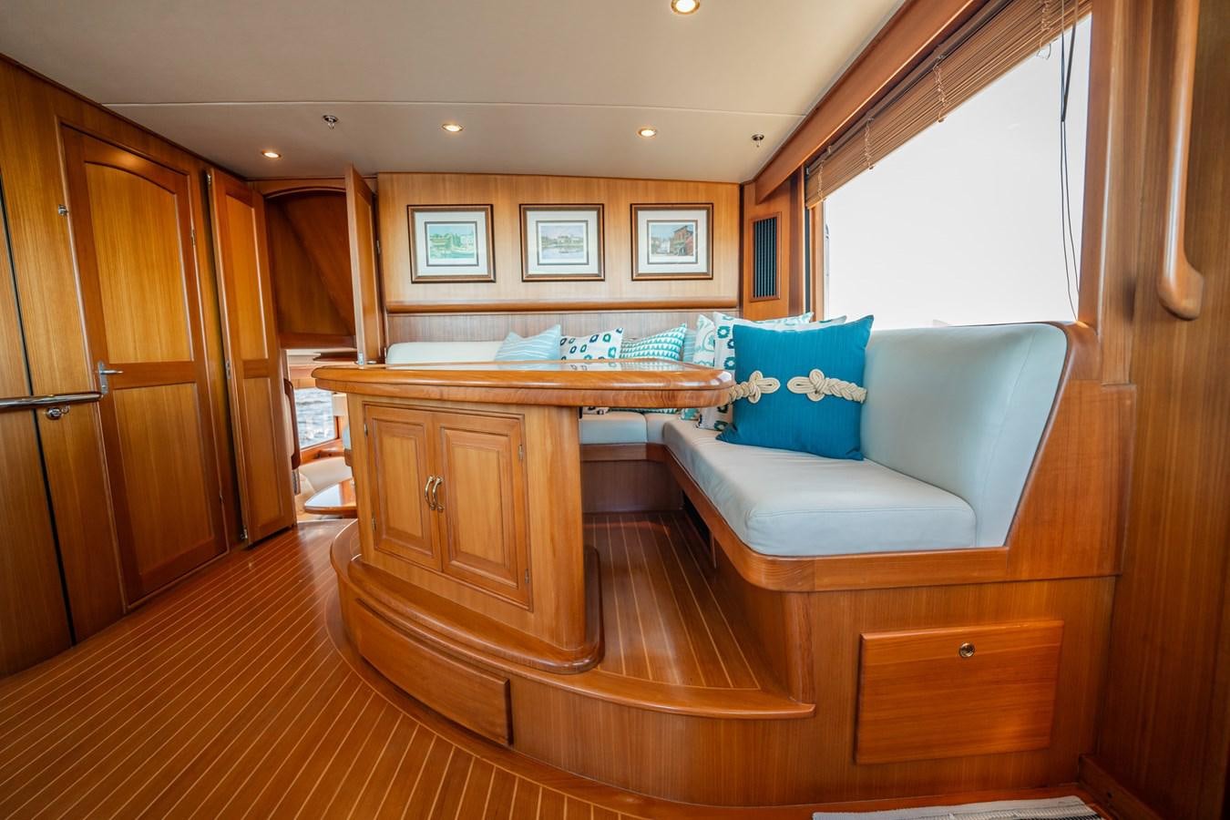 a living room with a couch and a table aboard BEBA Yacht for Sale