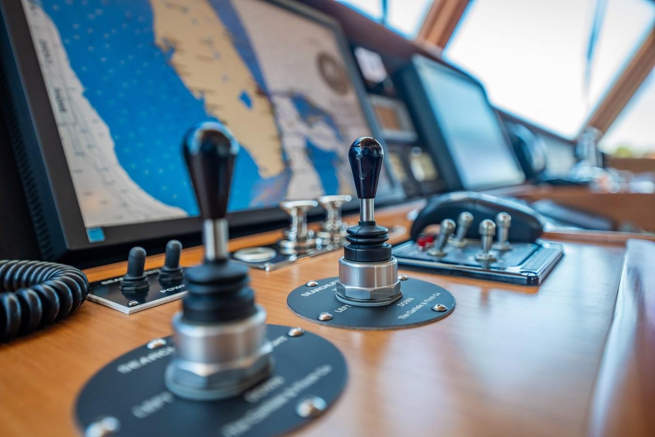 a microscope on a table aboard BEBA Yacht for Sale