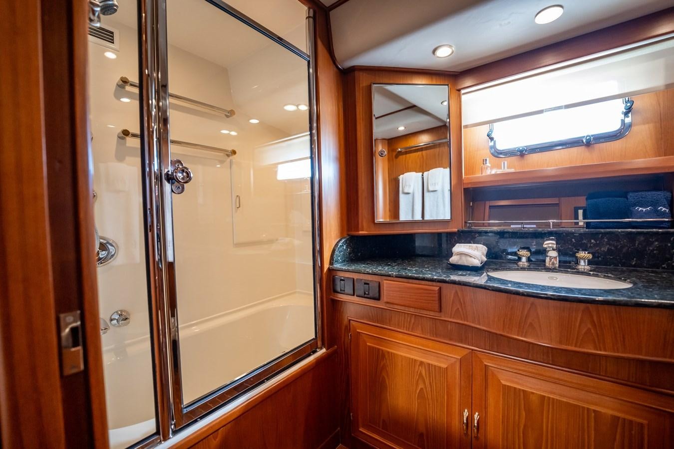 a kitchen with a glass door aboard BEBA Yacht for Sale