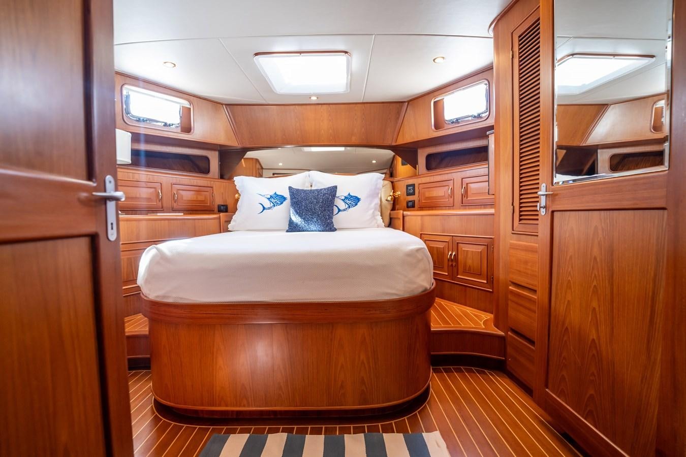 a bed in a room aboard BEBA Yacht for Sale