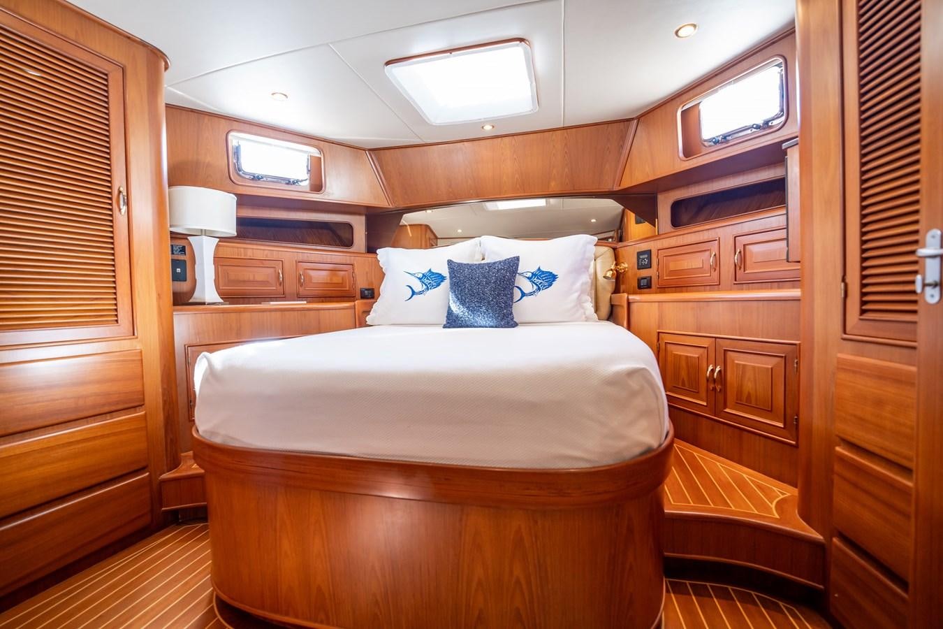 a bed in a room aboard BEBA Yacht for Sale