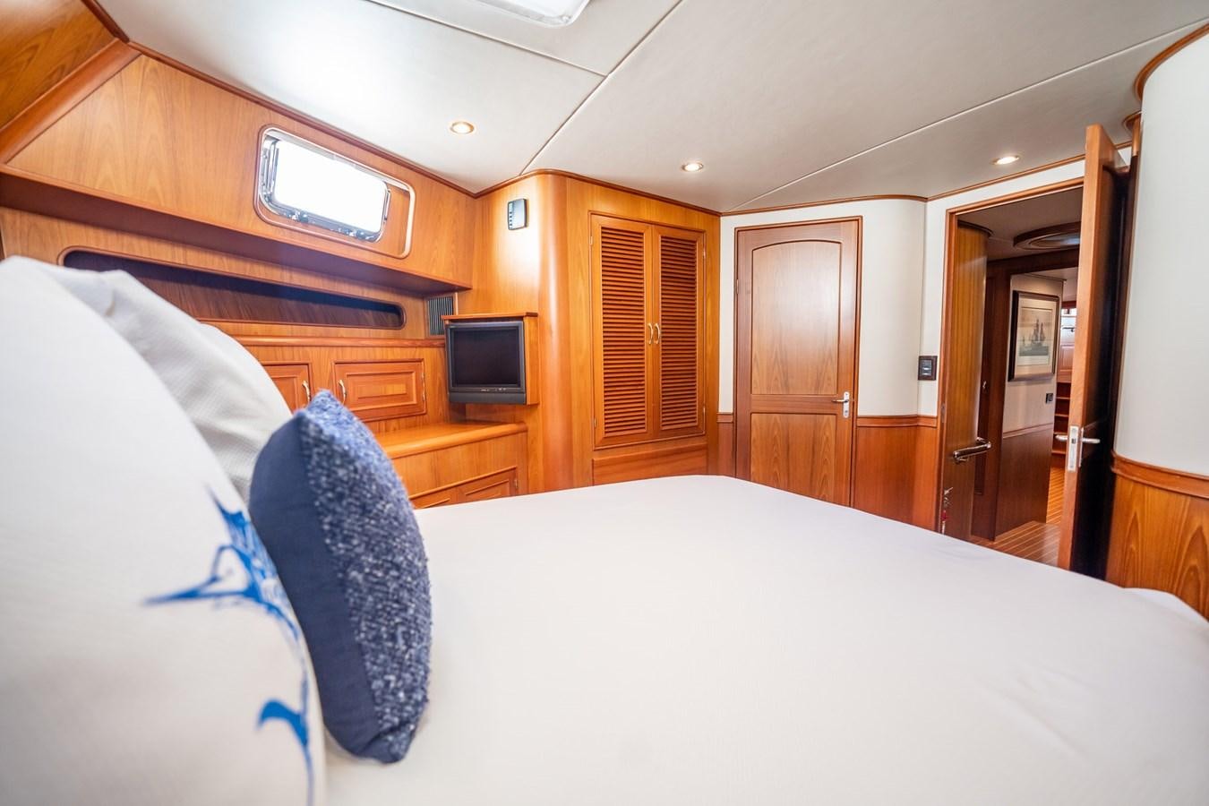 a bed in a room aboard BEBA Yacht for Sale
