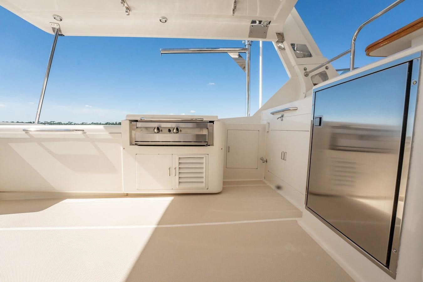 a room with white cabinets aboard BEBA Yacht for Sale