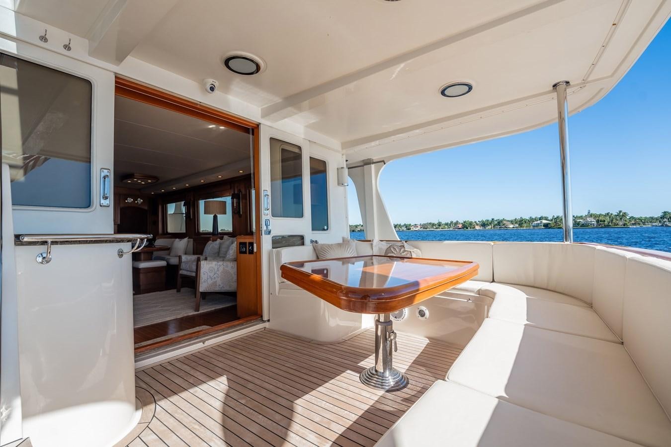 a room with a table and chairs aboard BEBA Yacht for Sale