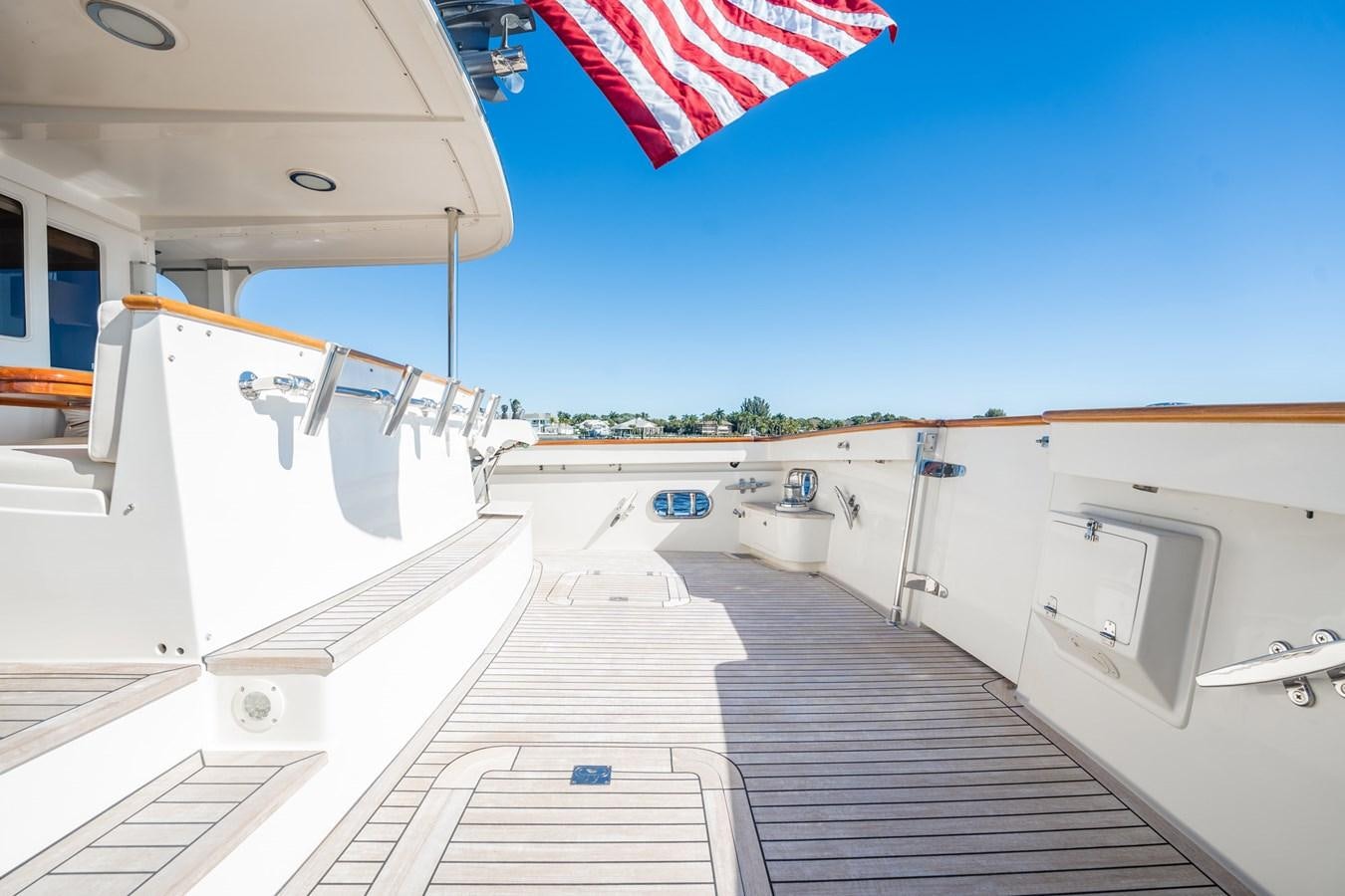 a deck with a flag on it aboard BEBA Yacht for Sale