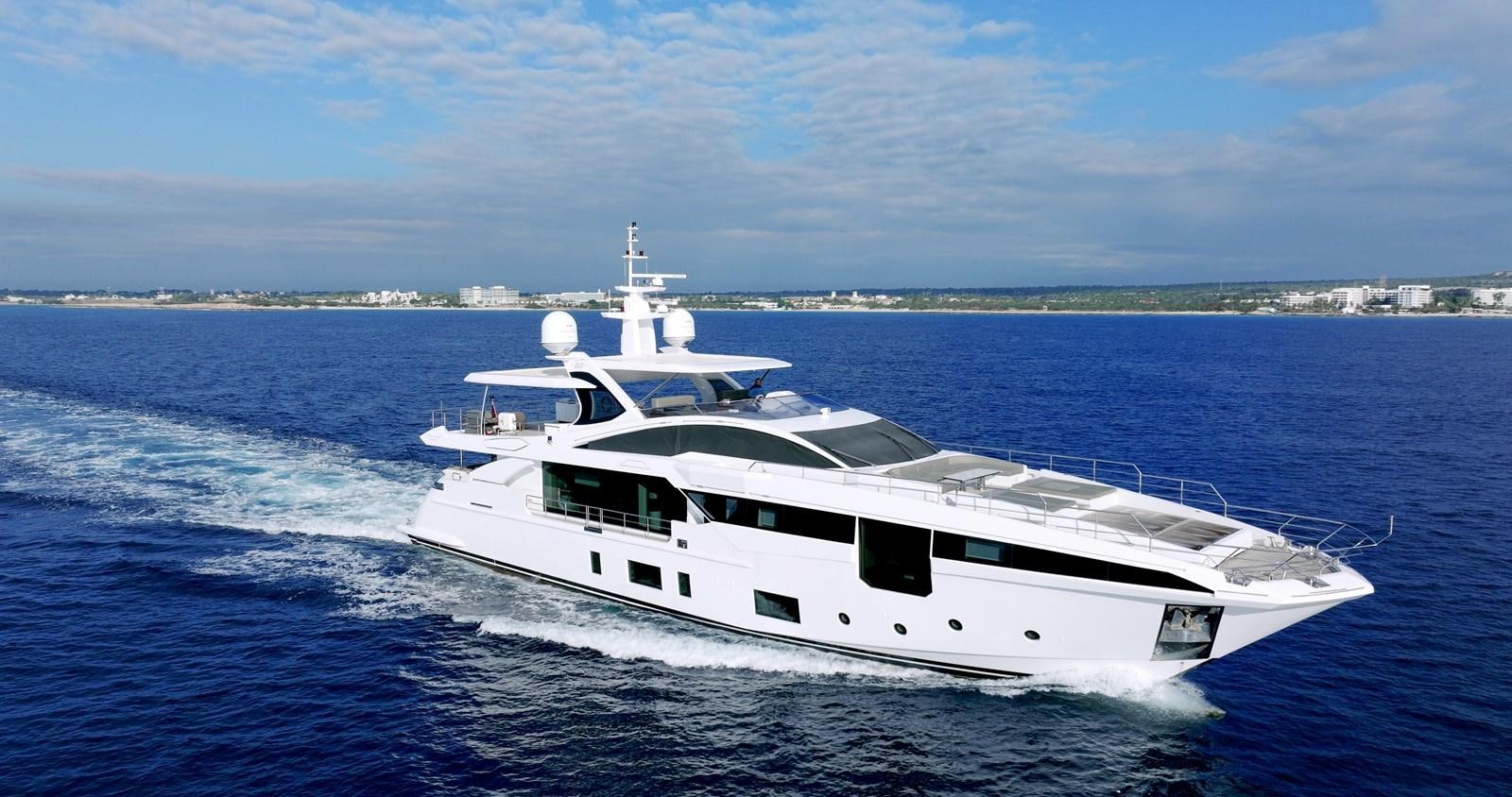 a white yacht on the water aboard IRYNA Yacht for Sale