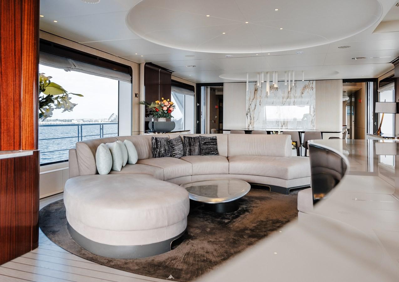 a living room with a couch aboard IRYNA Yacht for Sale