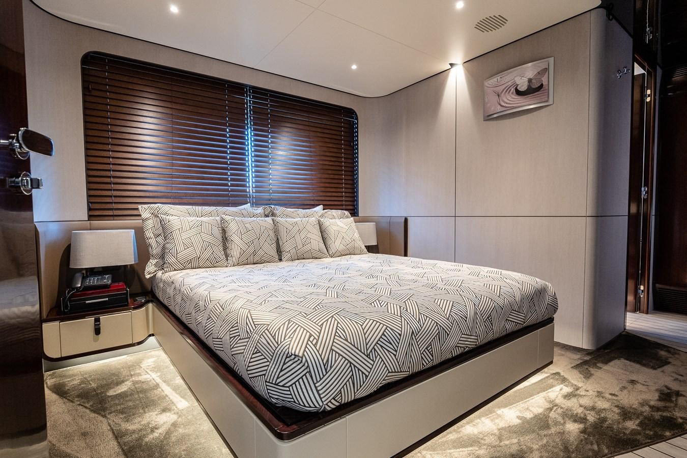 a bed in a room aboard IRYNA Yacht for Sale