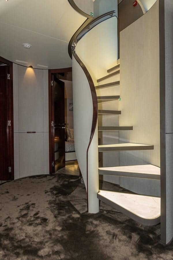 a staircase in a building aboard IRYNA Yacht for Sale