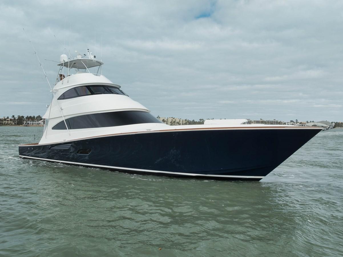 a white yacht in the water aboard COOKIE MONSTER Yacht for Sale