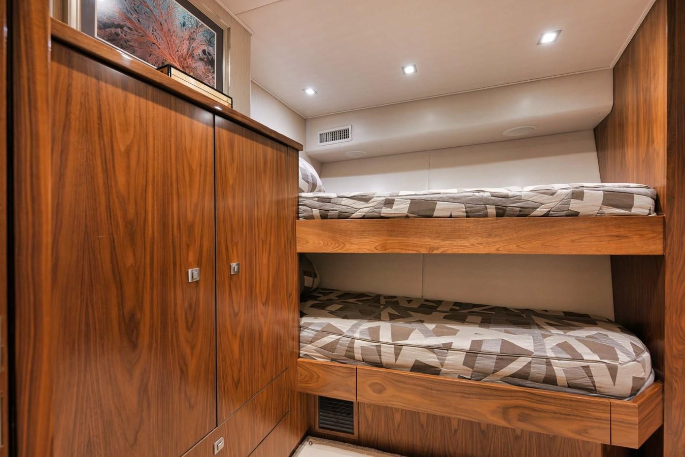 a closet with a bed aboard COOKIE MONSTER Yacht for Sale