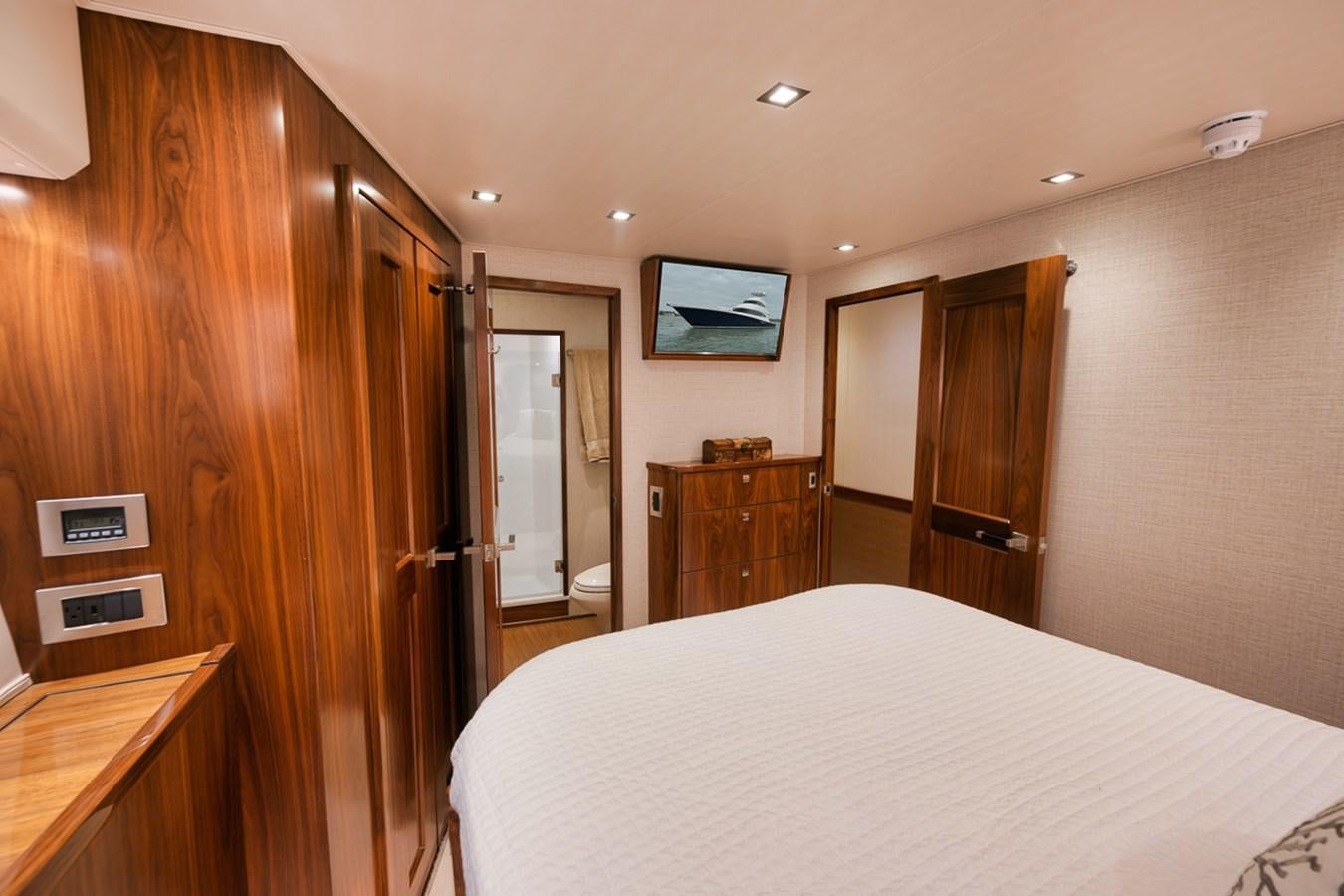 a hotel room with a bed aboard COOKIE MONSTER Yacht for Sale
