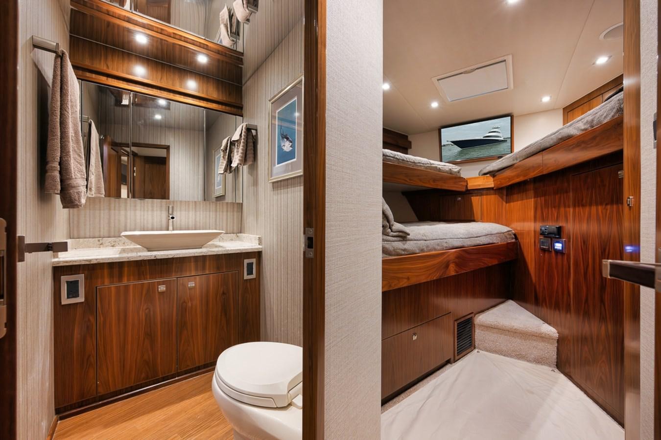 a bathroom with a sink and a mirror aboard COOKIE MONSTER Yacht for Sale