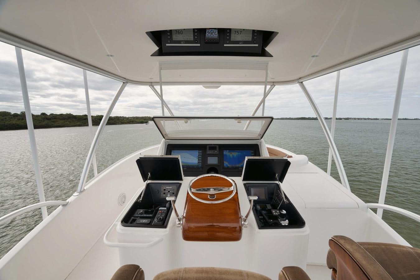 a boat with many electronic devices on it aboard COOKIE MONSTER Yacht for Sale