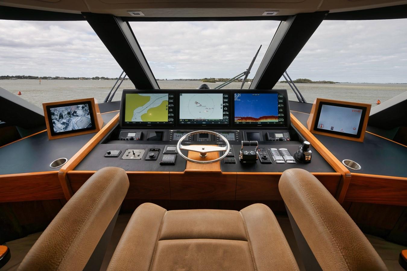 a control room with several monitors aboard COOKIE MONSTER Yacht for Sale