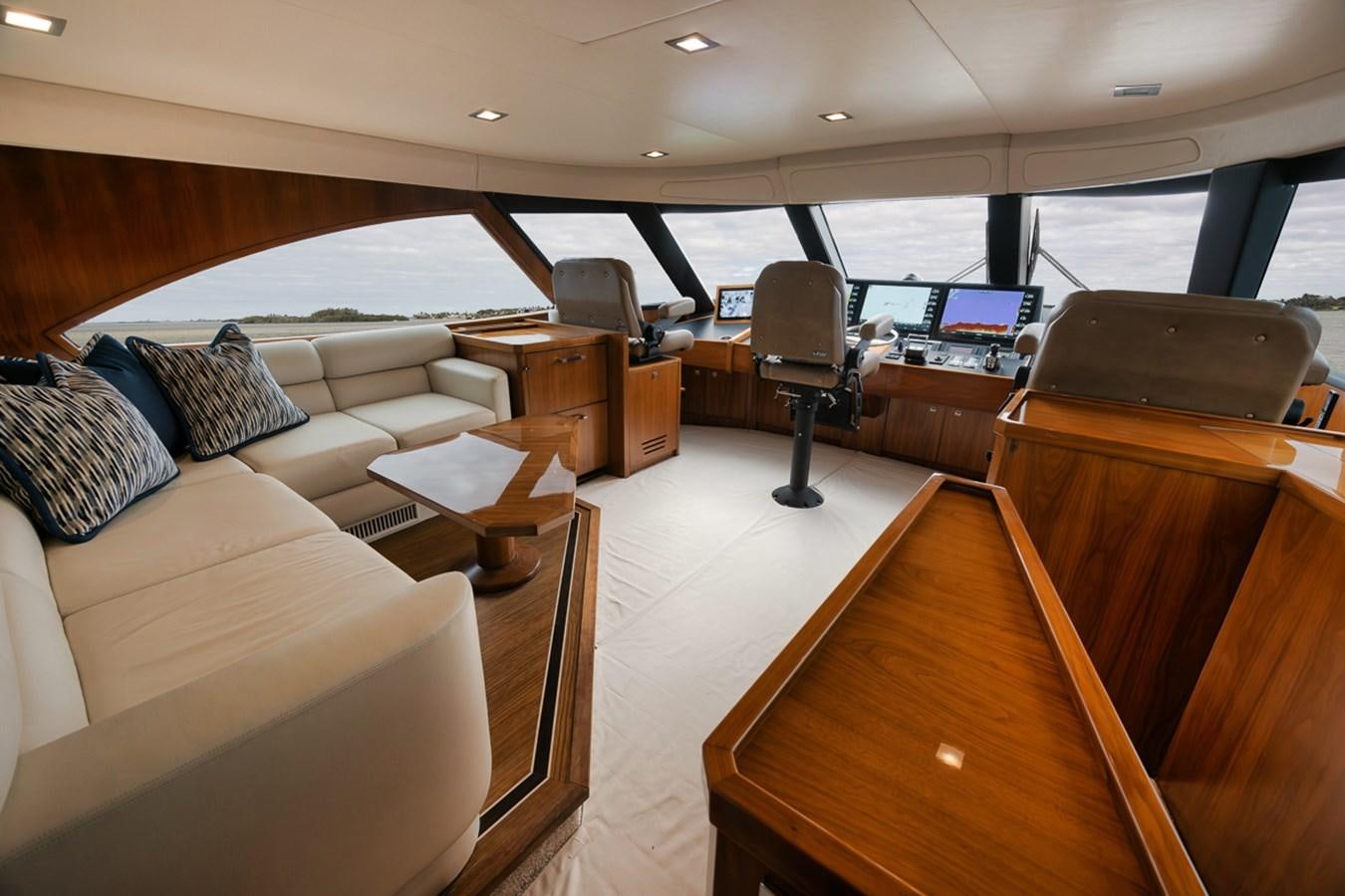 a room with a couch and a desk aboard COOKIE MONSTER Yacht for Sale