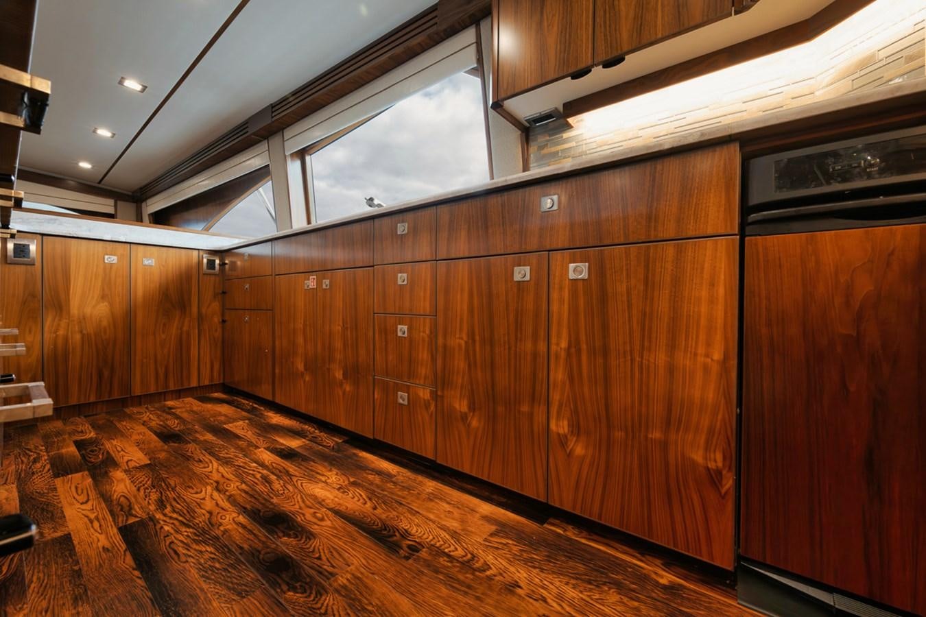 a large wooden kitchen aboard COOKIE MONSTER Yacht for Sale