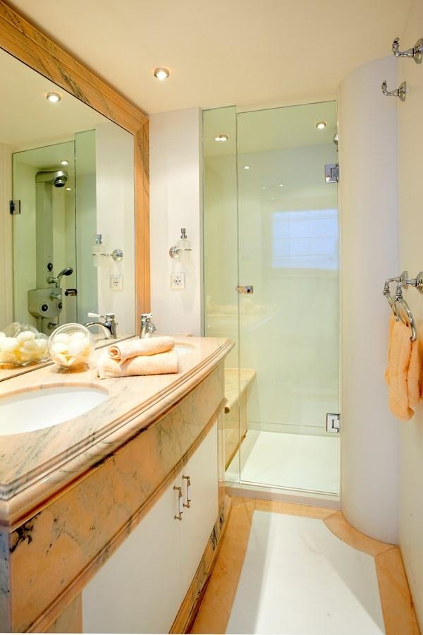 a bathroom with a sink and a shower aboard IRAKLIS L Yacht for Sale