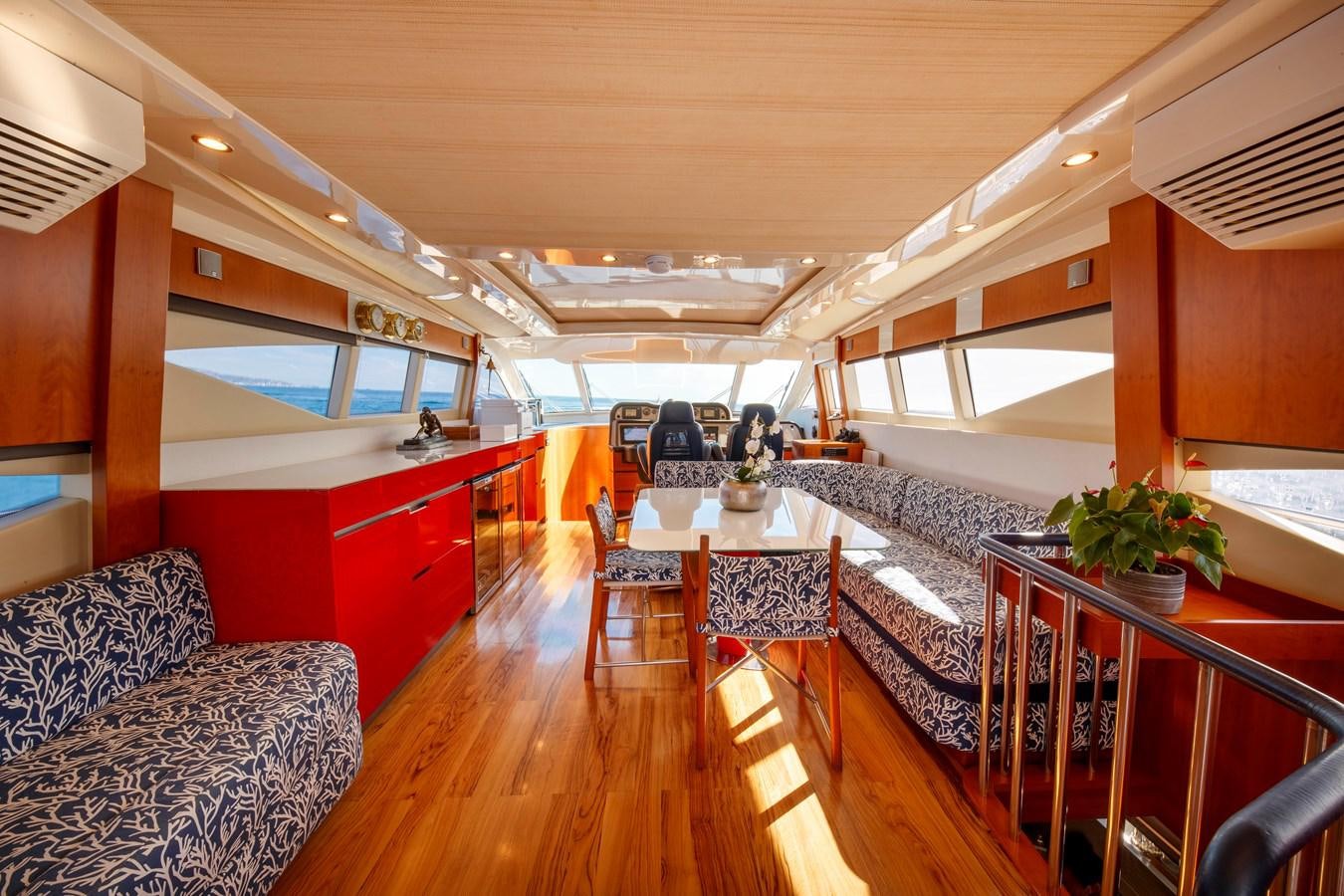 a room with a table and chairs aboard TRUE AUSTRIAN Yacht for Sale