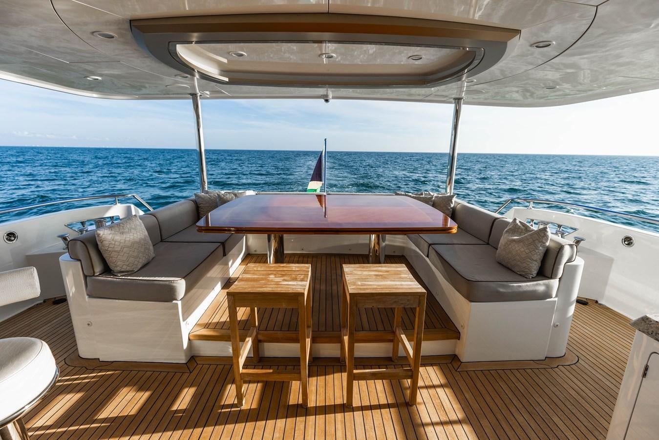 a table and chairs on a deck aboard SEE WORTHY Yacht for Sale