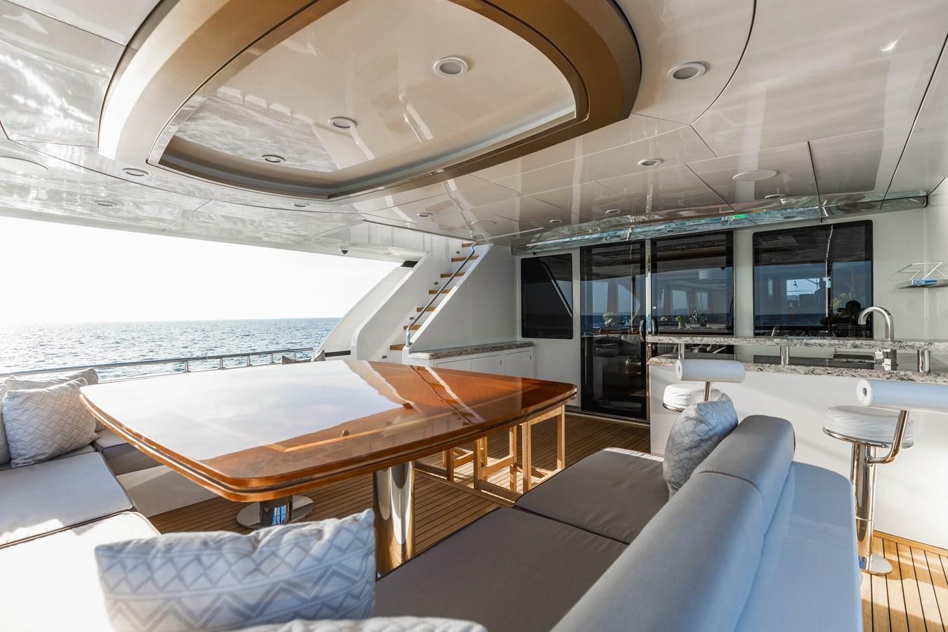 a room with a table and chairs aboard SEE WORTHY Yacht for Sale