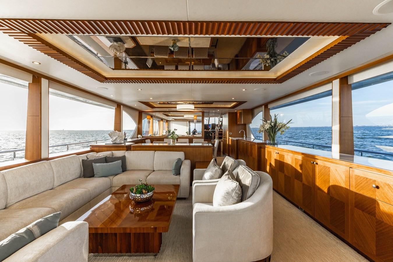 a living room with a large window aboard SEE WORTHY Yacht for Sale